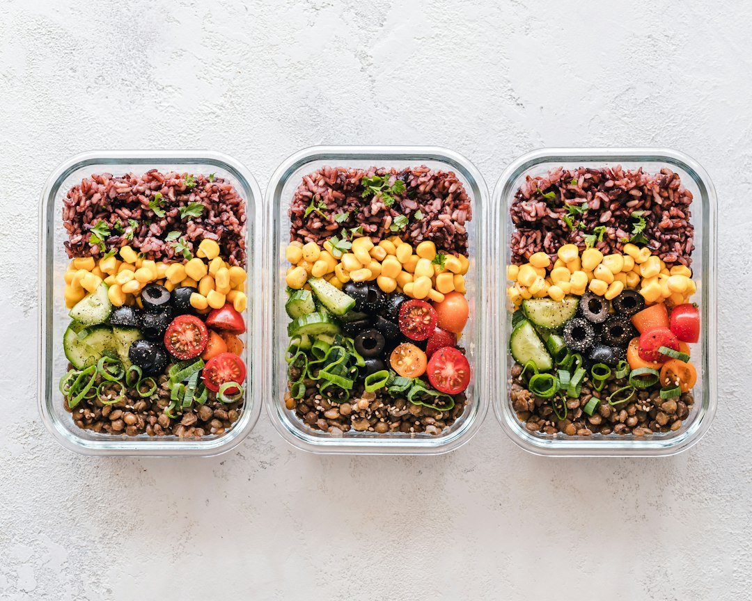 Plant-based meal prep bowls with vegetables and grains