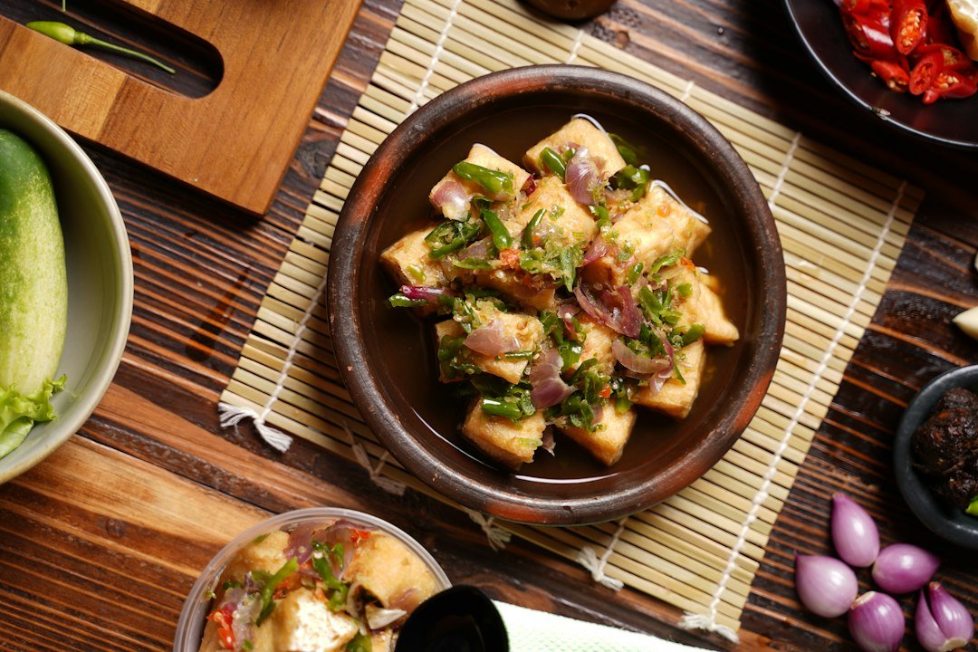 Fried tofu served with a dipping sauce