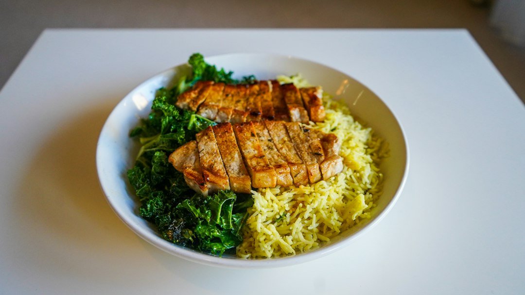 Cooked plant-based grain bowl illustrating prepared tempeh portions for freezing