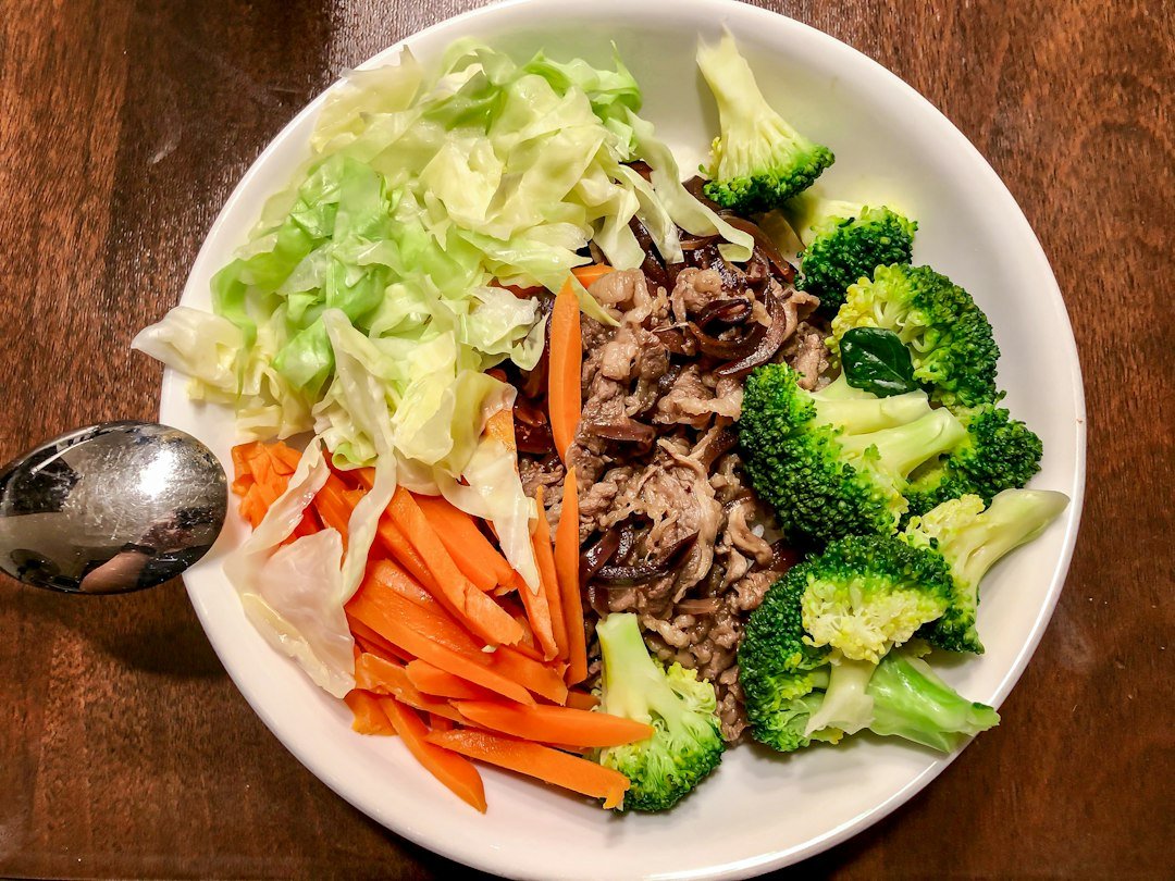 Savoury breakfast grain bowl with vegetables illustrating tofu and oats