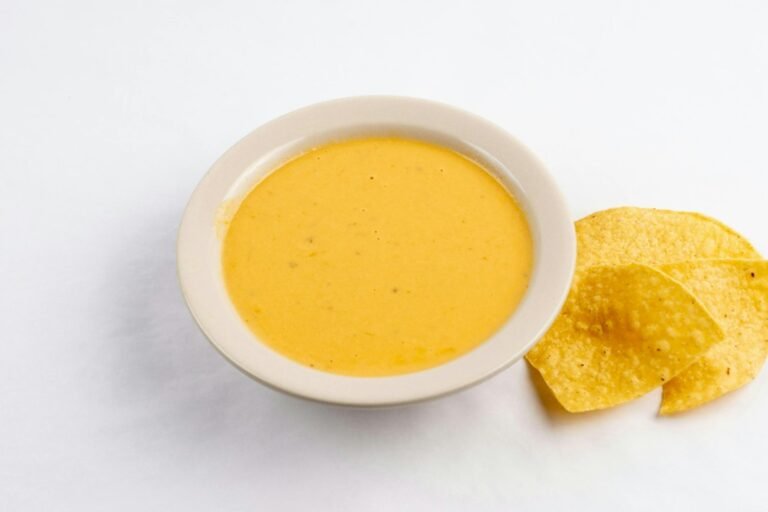 Creamy plant-based cheese-style sauce in a bowl