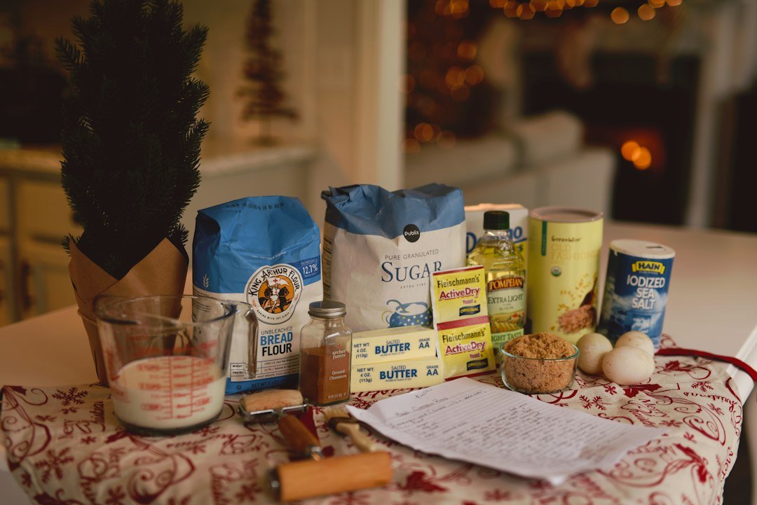 Vegan cookies and baking ingredients on a kitchen surface