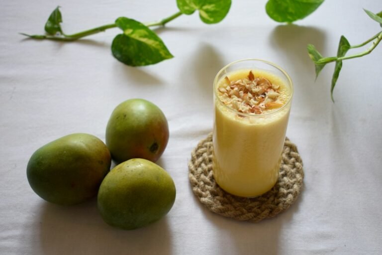 Colorful vegan fruit smoothie in a glass