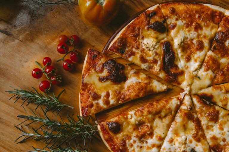 Pizza with melted cheese topping, illustrative photo for vegan cheese melting tips